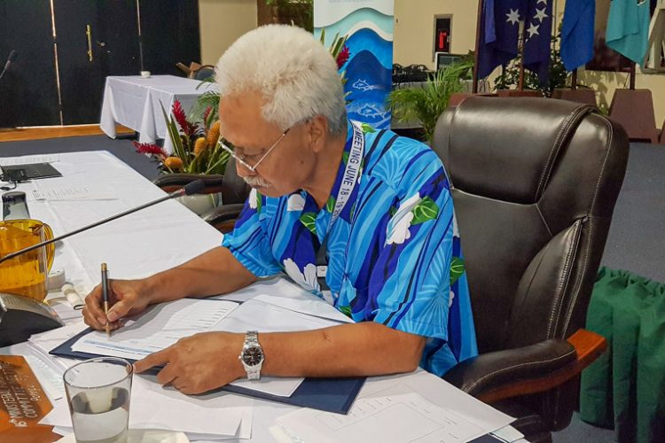 The Honourable Marion Henry, Federated States of Micronesia, signs the SAP. Hon. Henry was the FFC Ministerial Chair at this meeting, and the representative of the host government.