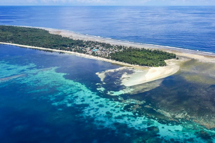 Aerial view of low-lying Ontong Java Atoll, Solomon Islands, is already severely affected by climate change. Photo: Iggy Pacanowski.